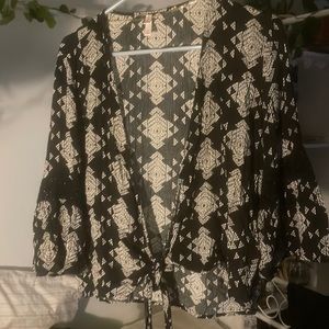 Black and white tie top. Long bell sleeve